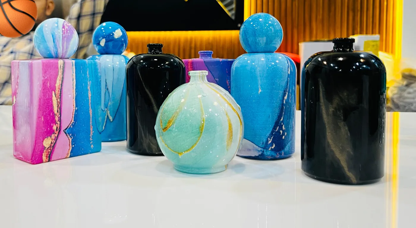Colour-marble bottle collection – hydrographic printing by RR Hydroxx