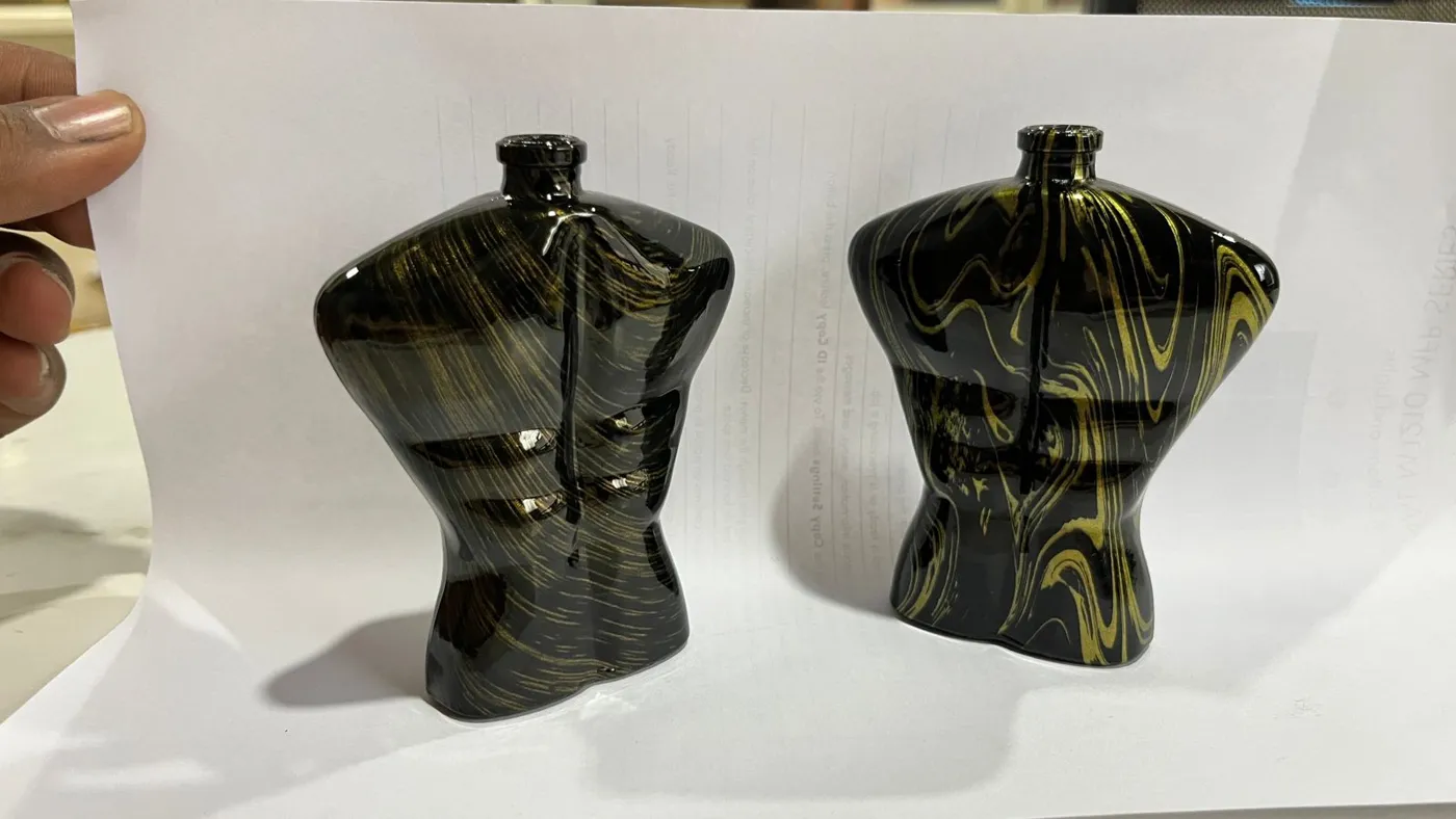 Torso bottles – black gold – hydrographic printing by RR Hydroxx