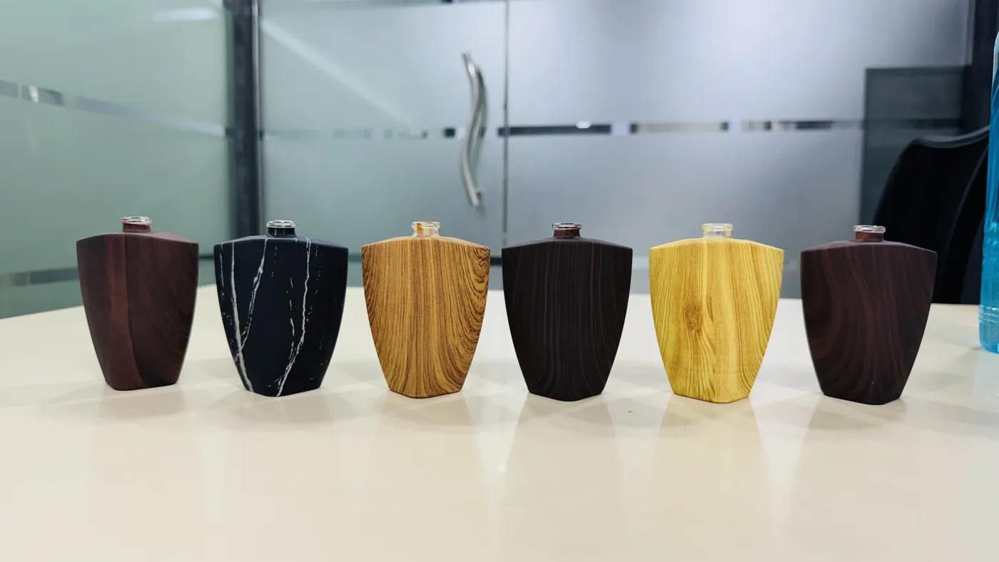 Wood & marble bottle range – hydrographic printing by RR Hydroxx